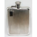 An Elizabeth II silver hip flask, Atkin Brothers, Sheffield 1952, length 14.5cm. Condition -