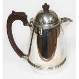 A silver coffee pot, William Neale, Birmingham 1922, gross wt. 9 3/4oz.