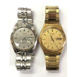 Two vintage Seiko stainless steel automatic wristwatches comprising of a Seiko 5 and another
