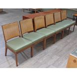 A set of six Glenn of California walnut and bergere back dining chairs circa 1960s, the design