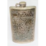 An eastern white metal hip flask, marked 'Silver', height 16.5cm.