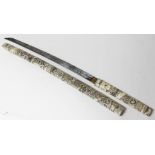 A Japanese carved bone short sword, length 83.5cm.
