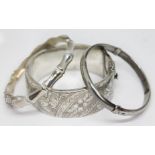 A group of three hallmarked silver bangles.