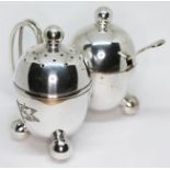 A silver plated cruet with shipping line flag, designed by Christopher Dresser for Elkington & Co.