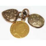 A George III 1803 half guinea together with two yellow metal lockets, gross wt. 11.38g.