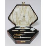 A cased Art Deco silver gilt and enamel manicure set, Walker & Hall, Chester 1939.