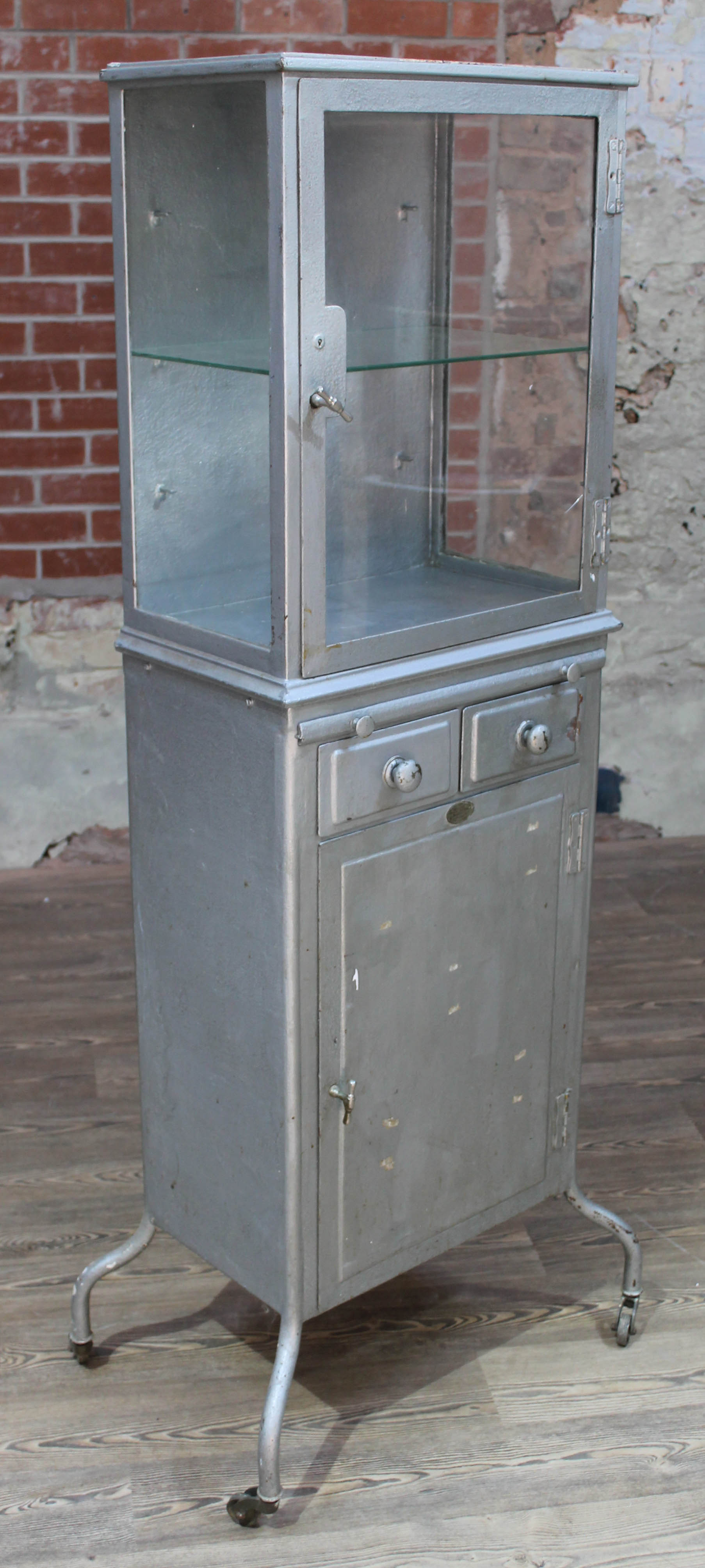 An Edwardian surgical instrument cabinet, labelled 'White & Wright Surgical Instrument Makers 93