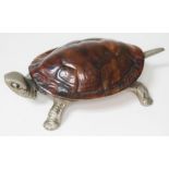 A novelty desk bell formed as a tortoise with real tortoiseshell shell, length 16.5cm. Condition -
