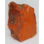 A butterscotch amber nugget, length 6cm, wt. 38.50g.