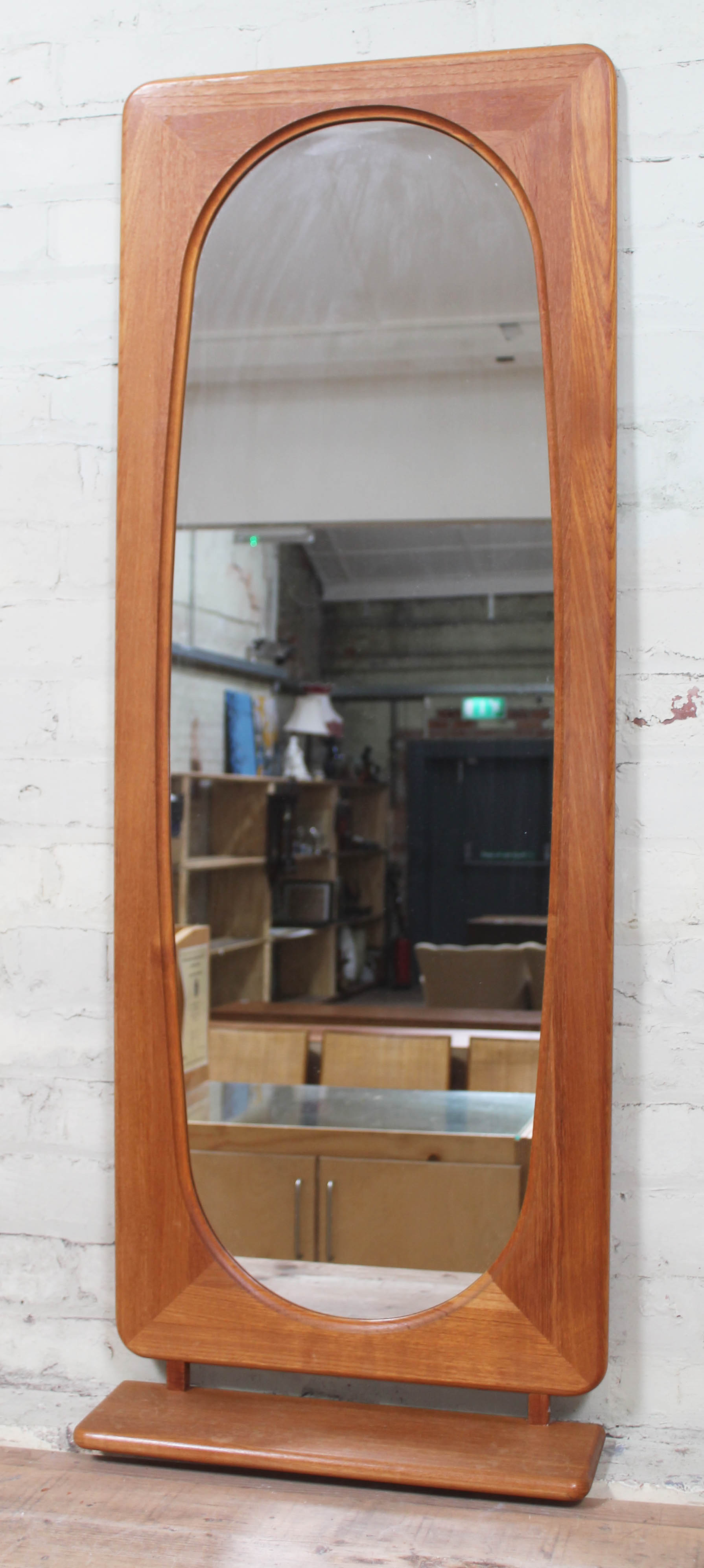 A Danish teak mirror circa 1960s with lower shelf height 140cm.