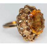 A ring set with a mixed cut citrine, marked '9ct', gross wt. 7.62g, size N.