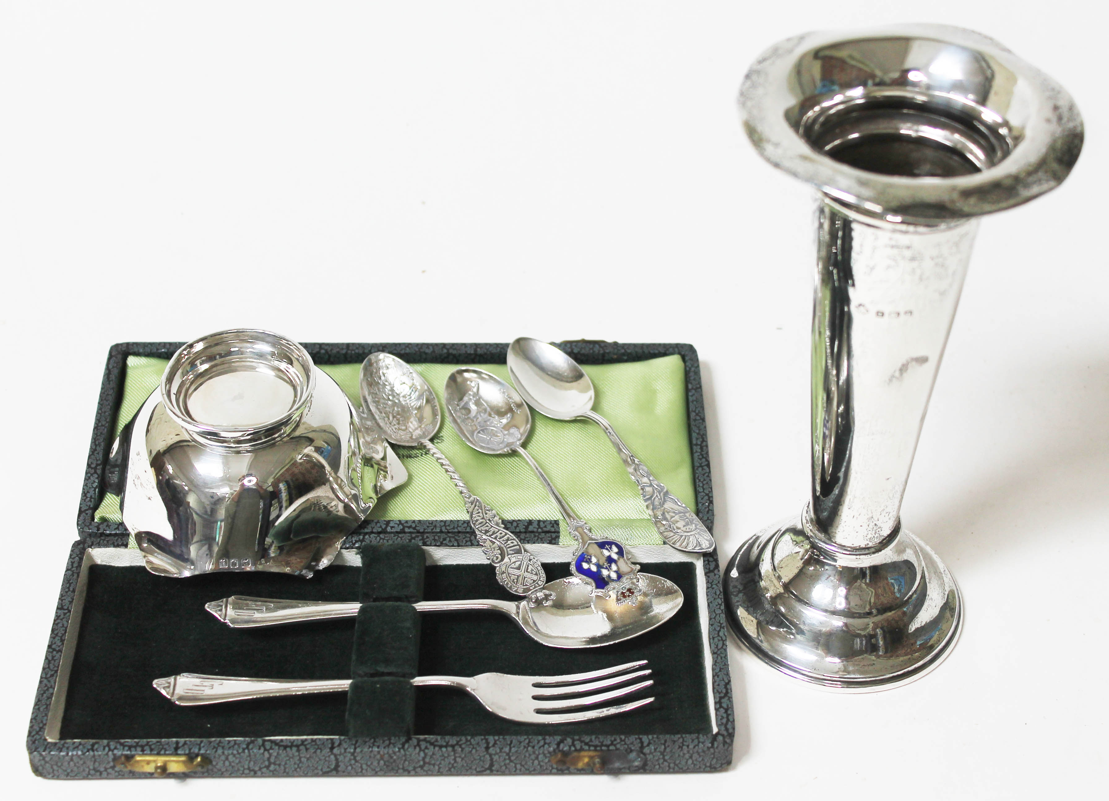 A mixed lot of hallmarked silver comprising a vase, a dish and a cased christening fork and spoon,