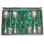 A set of six silver teaspoons and sugar tongs, John Round and Son, Sheffield 1923, with associated