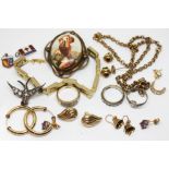 A mixed lot of jewellery including four pairs of 9ct gold earrings, various marks, gross wt. 5.