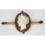 A shell cameo brooch, length 43mm, unmarked, gross wt. 4.96g.