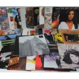 A crate containing approximately 34 LPs including Best of Cream, The The - The Infected, Deep Purple
