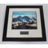 A framed and mounted photograph depicting Mount Everest signed by Edmund Hillary, gross dimensions