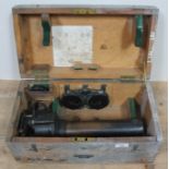 A Canadian Kodak 7 x 50 gunsighting telescope, in wooden box, with accessories.