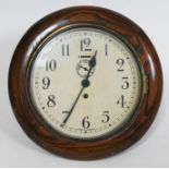 An oak framed wall clock, diam. 28cm.