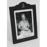 A photograph of the Queen mother signed and dated 1993 within original leather