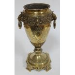 A Victorian brass oil lamp base with armorial decoration, the weight base stmap 'W&W', height 33cm.