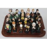 A group of 24 Royal Doulton Dickens figures.