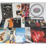 A group of 14 LPs (some double albums) and a couple of 12" singles. Albums include The Cure "