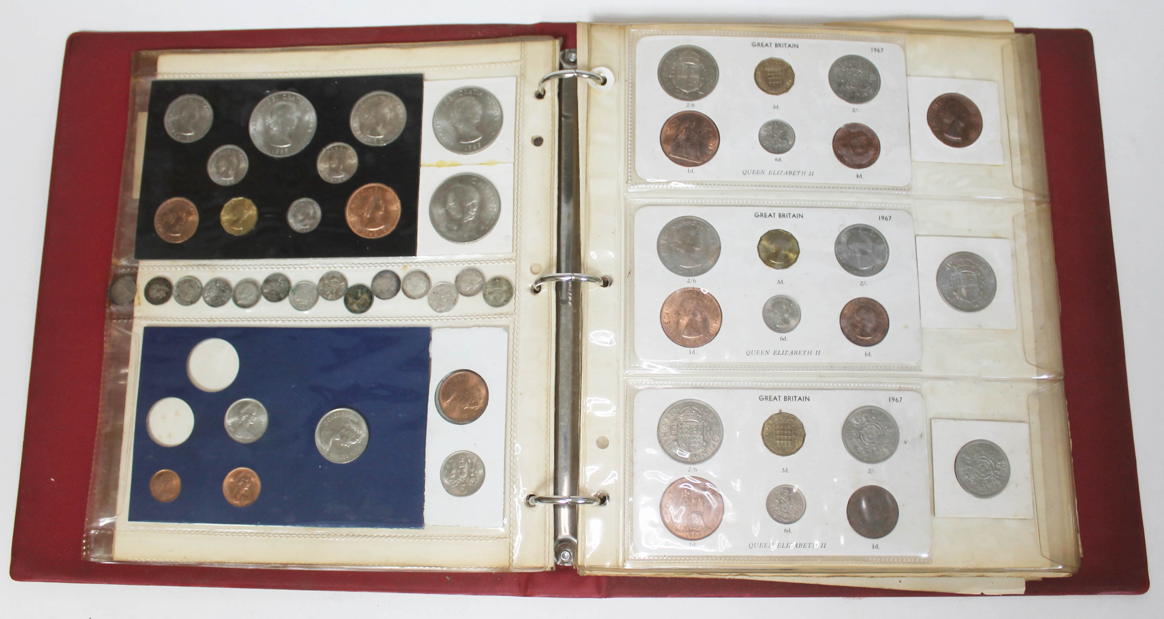 An album of GB and world coins, mainly proof sets, mid 20th century.