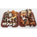 A collection of 24 Beswick dog figures.