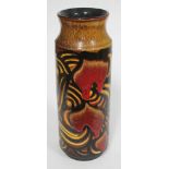 A Poole Afghan cylindrical vase with hourglass collar, with red drip effect on black, brown and