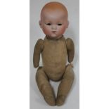 A bisque headed Armand Marseille doll.