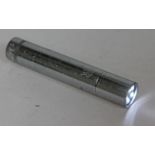 A Rolls Royce torch, length 10.5cm.