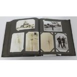 A WWI era postcard album containing approx. 150+ cards including silks, sweetheart, personal, mainly