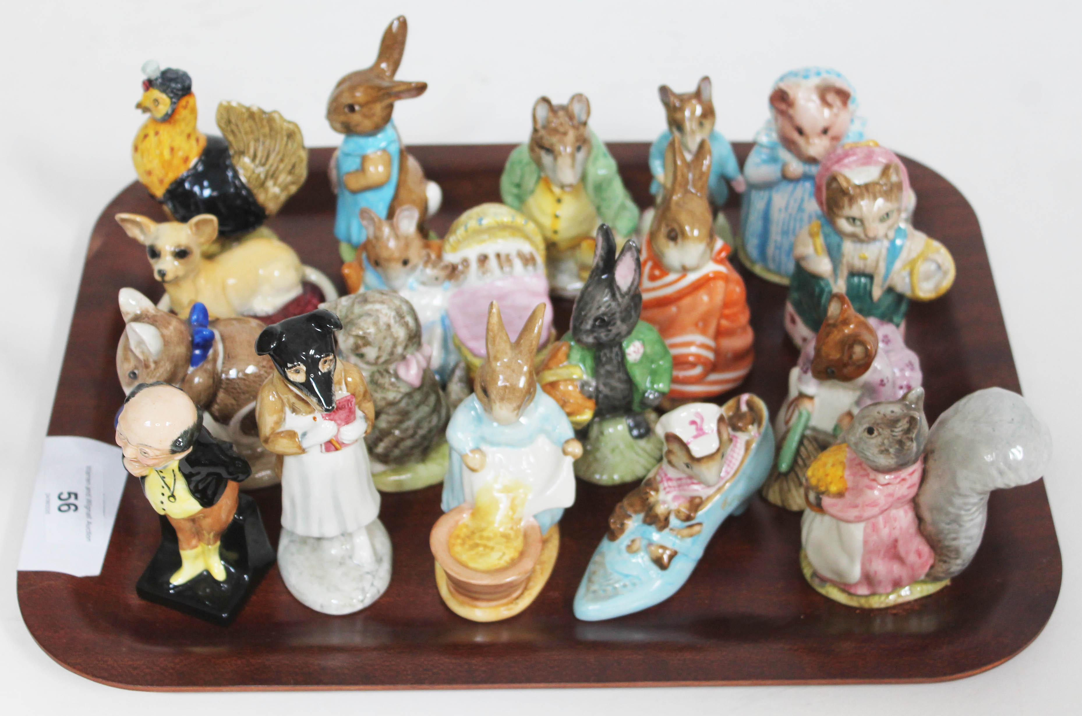 A tray of 17 mainly Beswick Beatrix Potter character figures and a Royal Doulton Pickwick figure.