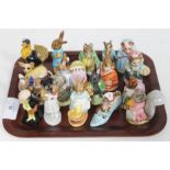 A tray of 17 mainly Beswick Beatrix Potter character figures and a Royal Doulton Pickwick figure.
