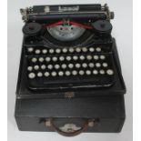 A pre-war Underwood portable typewriter.