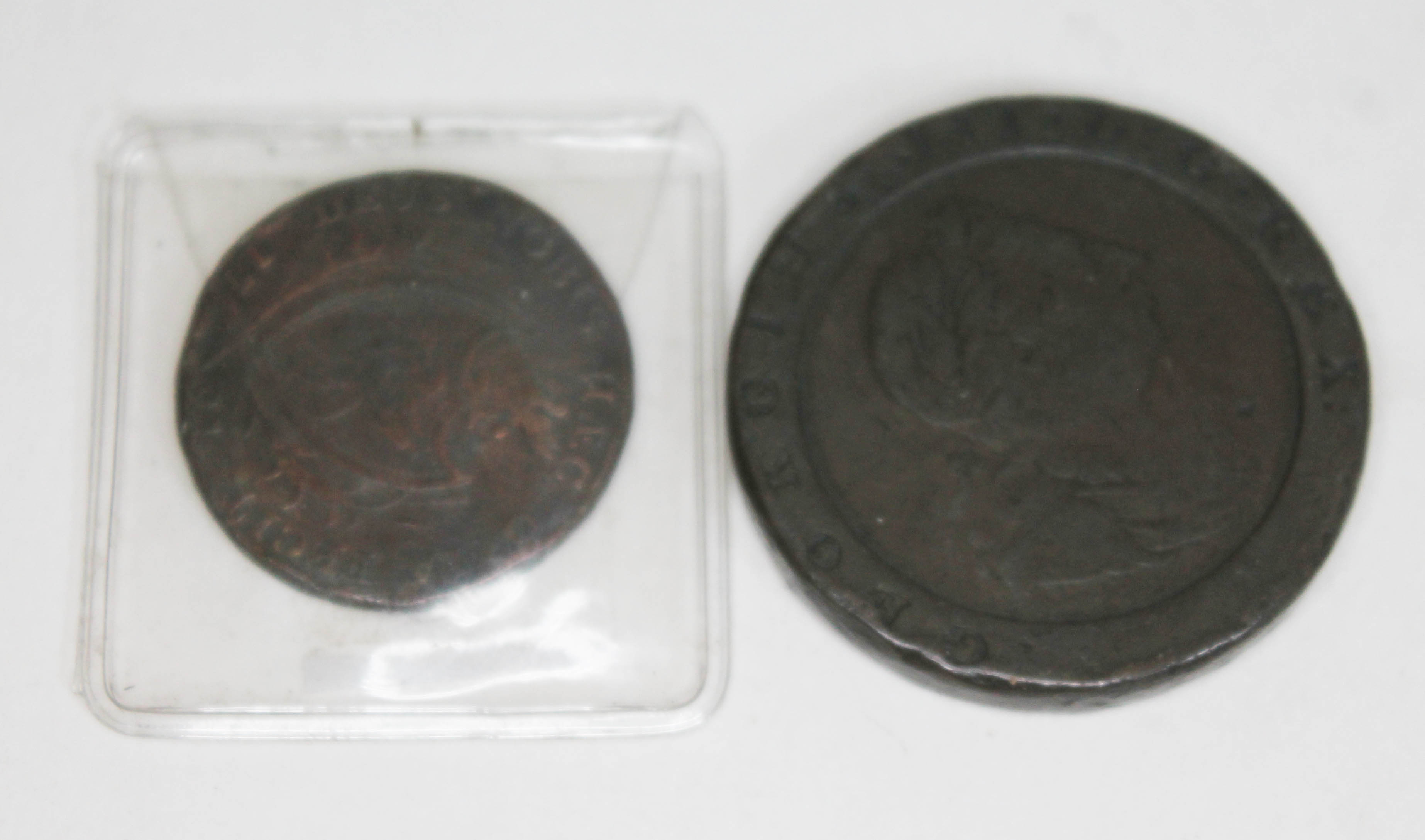 A Liverpool 1791 half penny token and a George III 1797 cartwheel penny.