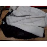 Two vintage mid length fur jackets.