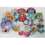 A quantity of vintage Polly Pocket toys.