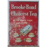A vintage tin advertisement sign 'Brooke Bond Choicest Tea...', 50cm x 75cm.