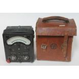 A Universal Avometer Model 40 Mark II volt meter in a leather carry case.