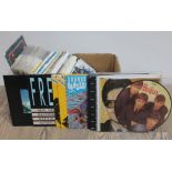 A box of 45s including The Beatles Love Me Do on picture disc etc.