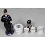 A group of six Royal Doulton figures comprising Winston Churchill 1940 toby jug, The Bobby HN2778,