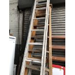 A set of extending aluminium ladders