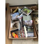 A box of books, CDs, DVDs etc