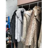 A ladies Astraka leopard print coat, an Astraka knitted coat with leopard print, and two ladies