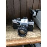 A Mamiya/Sekor Super TTL camera with a super-Takumar 1:1.4/50 lense