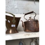 A copper kettle and a copper and brass coal scuttle