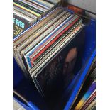 A box of LPs and 12" singles (includes Bob Marley, Lou Reed and others)