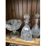 Three glass decanters and a Rose Collection glass bowl with box